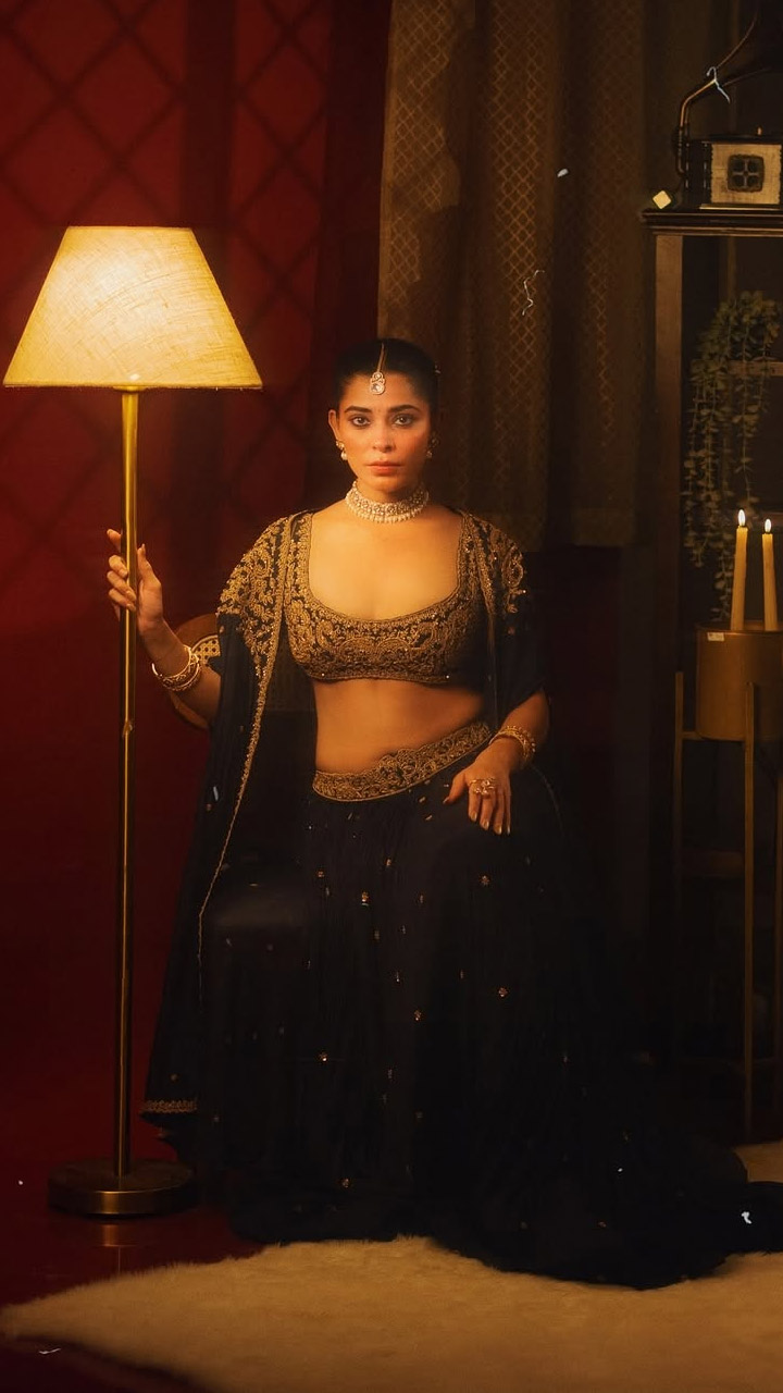 Her regal aura shines through in every frame, showcasing timeless beauty.